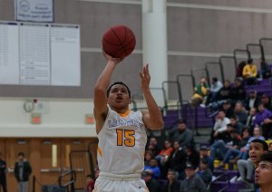 Tiger hoopsters struggle to keep up in tough WYL schedule Sean Patrick takes aim against Hanford West.